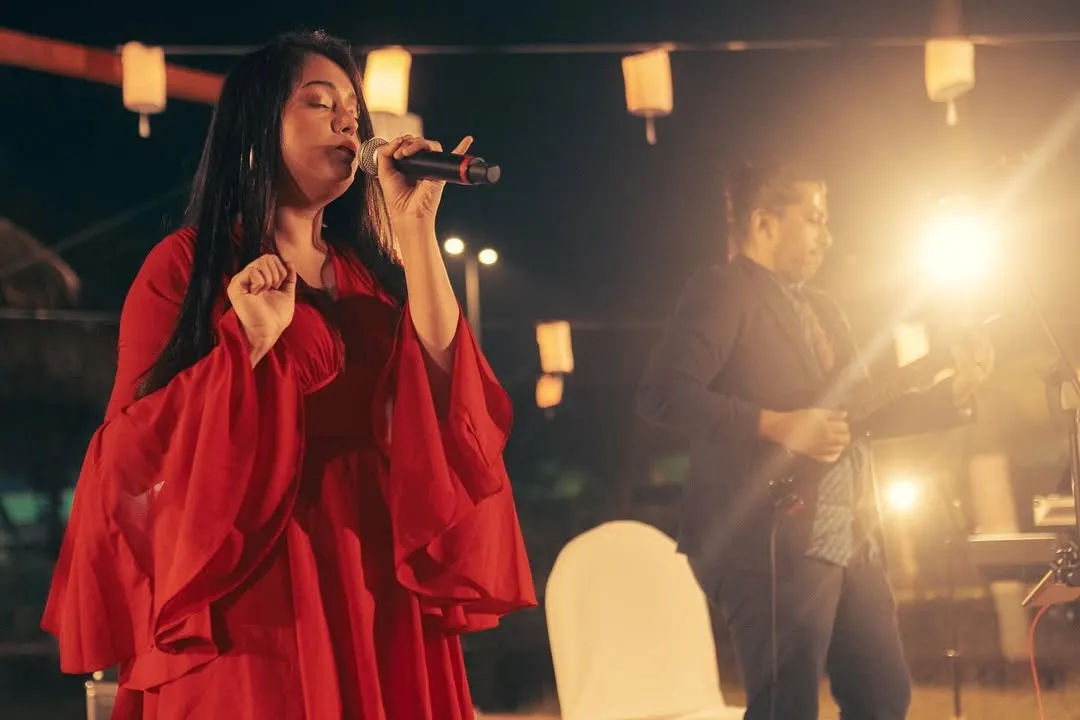 There's nothing like the magic of a wedding. Dressed in red and singing my heart out for a beautiful couple's special day. We curate soulful and energetic wedding music setlists that create memories for a lifetime.