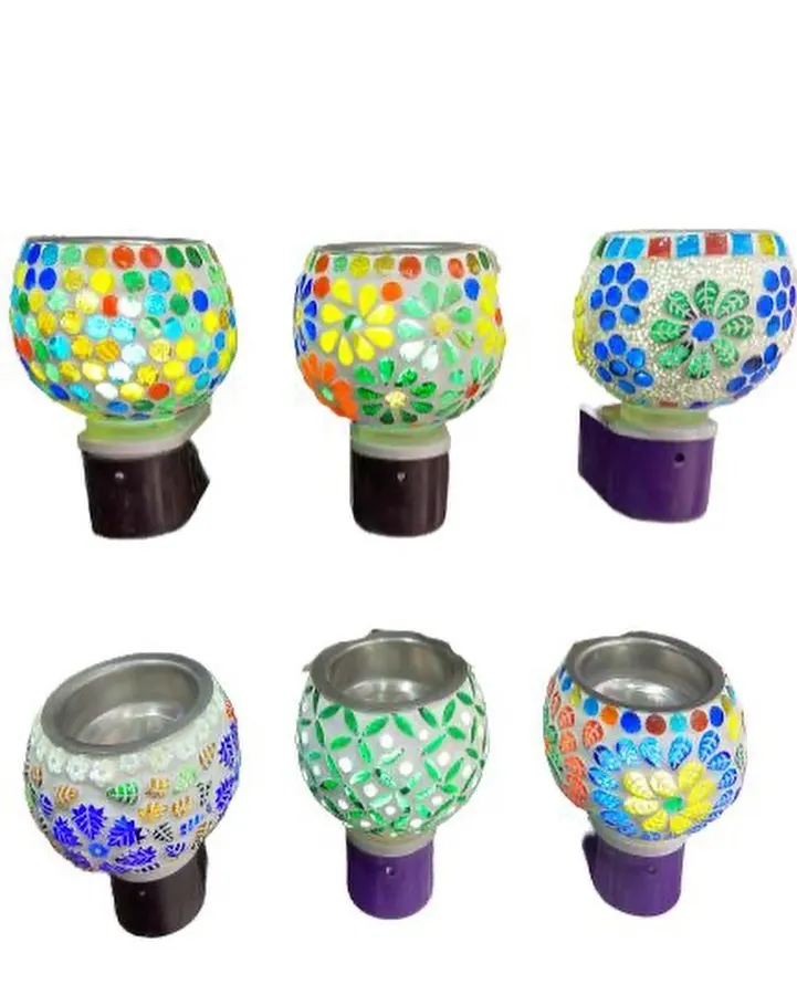 Explore our vibrant collection of plug-in mosaic aroma lamps. Each one has a unique, handcrafted design and color combination, serving as both a beautiful night light and a fragrance diffuser for any room in your home.