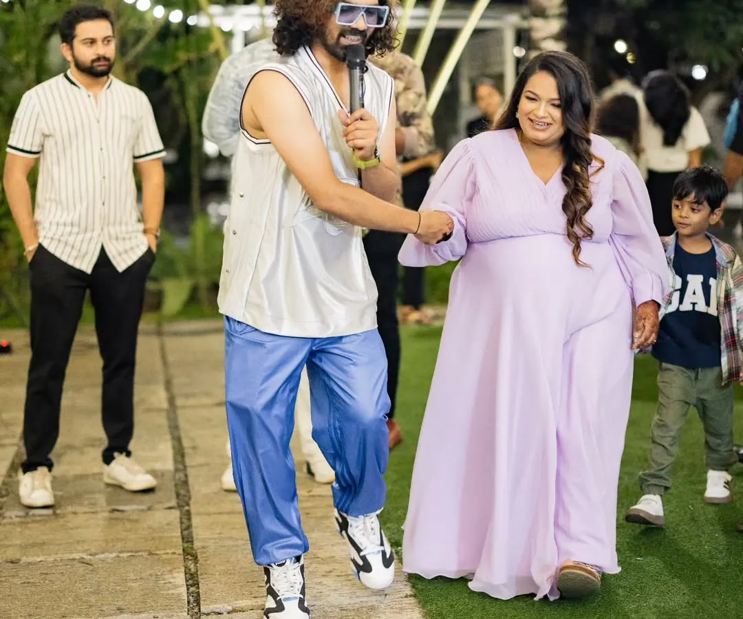 Getting guests involved is what I do best. Here I am, sharing a laugh and a dance during a wedding celebration, making sure everyone feels like part of the fun. My interactive hosting style is all about creating personal, memorable moments.