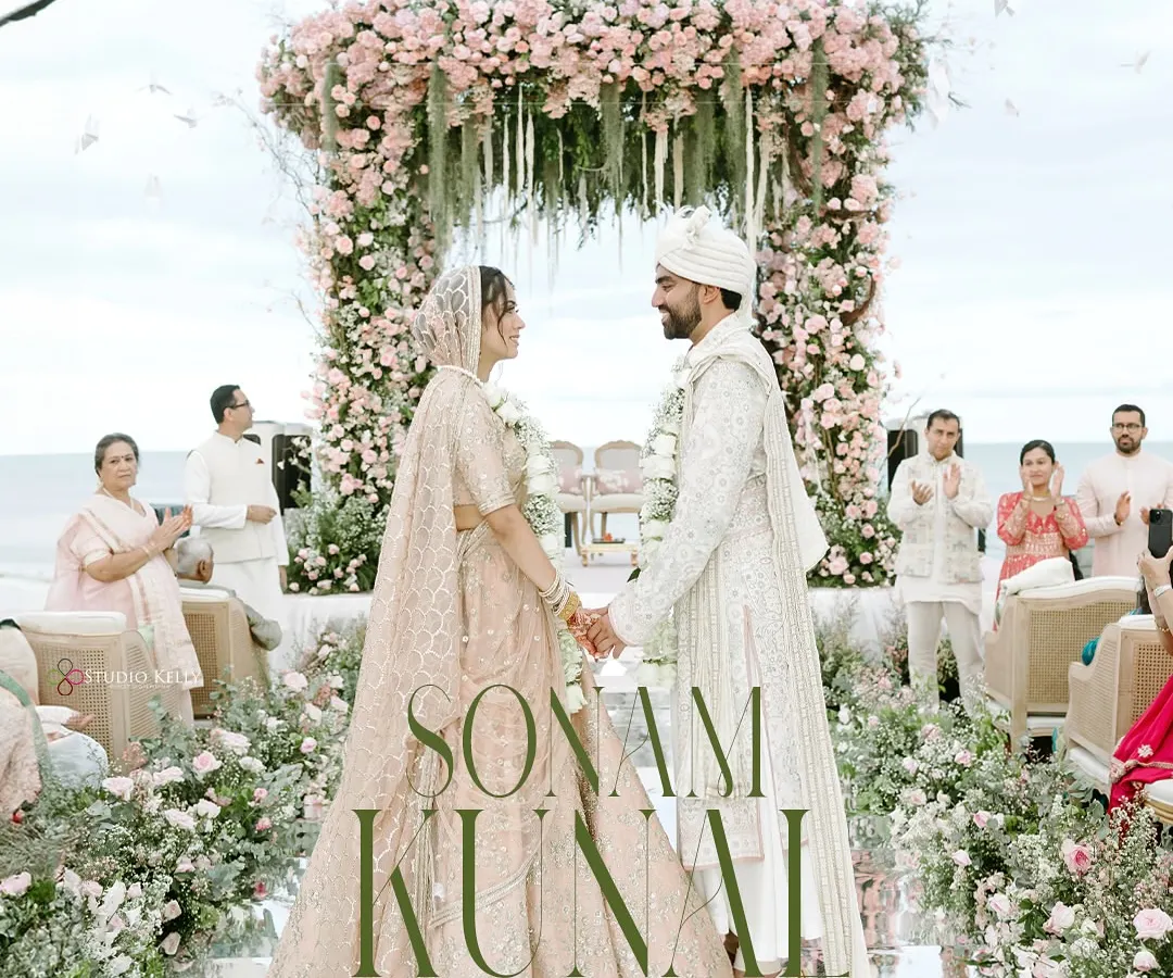 Against the serene backdrop of the Thailand coast, the couple shares a quiet moment under a magnificent floral mandap. This image captures the peaceful, romantic essence of a destination beach wedding.