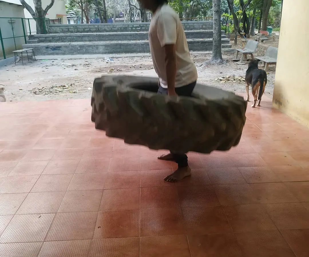 Strength is not just for the dojo. We use unconventional methods like tractor tire training to build the real-world, functional power you need to be confident and capable.