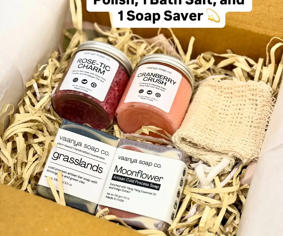 Here is a look inside one of our larger custom hampers. This set includes two artisan soaps, a body polish, a bath salt, and a natural soap saver, all nestled in eco-friendly shredded paper. We can create gift boxes like this for any budget or occasion.