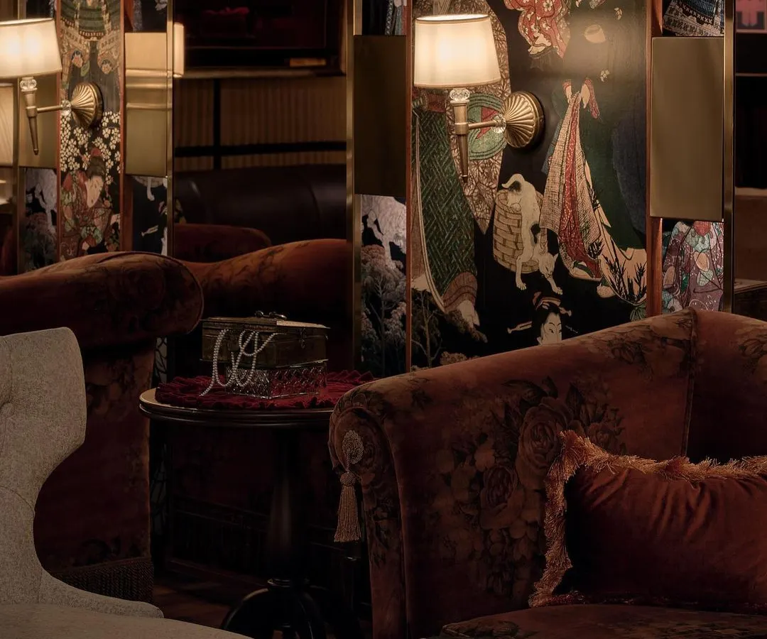 In the award winning ZLB23 speakeasy, we created intimate seating nooks that draw guests into the story. The design layers rich textures, from velvet sofas to a custom Japanese graphic wallpaper, to build a sophisticated and mysterious atmosphere perfect for a hidden jazz and cocktail bar.