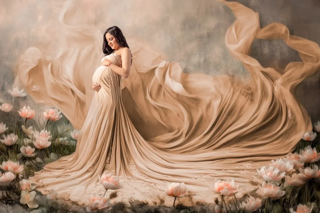 This is what a dream setup looks like. For this fine art maternity portrait, I used flowing fabrics and a digitally enhanced floral landscape to create a truly magical, painting-like memory for this mommy-to-be.
