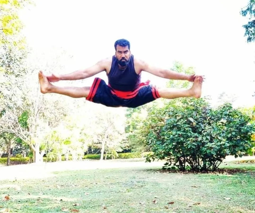 This is our Kalari master, Moideen Rafi. Kalaripayattu is the mother of all martial arts, and the flexibility you build here is unmatched. This is not a gym workout; this is true body control.