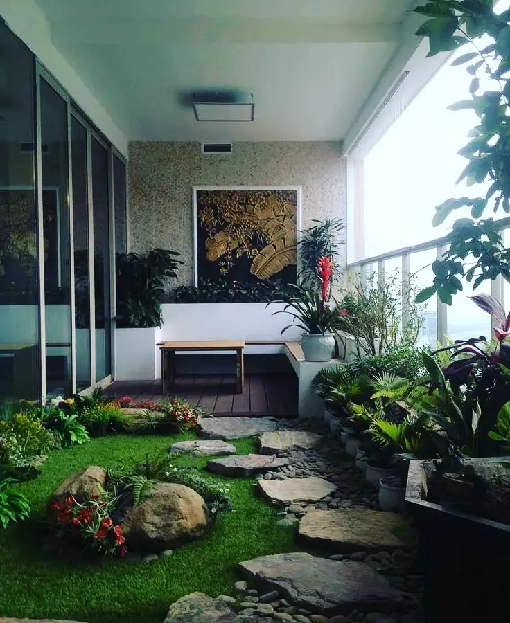 Even a long, narrow balcony can become a lush, private jungle. For this project, I used a mix of natural stones, a soft lawn, and layered plants to create a path that feels like a walk through nature, right at home.