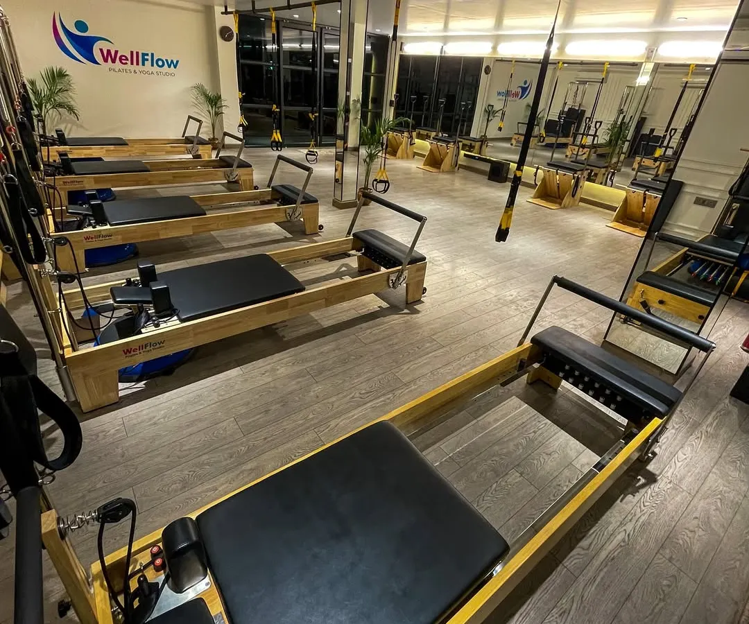 Welcome to our space. We've designed our studio to be a clean, modern, and inspiring environment, fully equipped with top-of-the-line Pilates Reformers and TRX systems to support your wellness journey.
