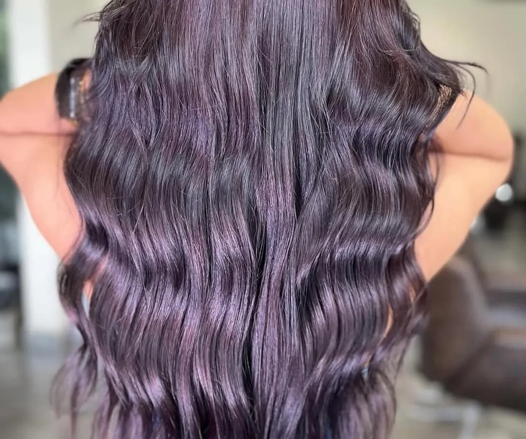 For those who love a pop of color, this dark lavender look is a real head-turner. We use high-quality pigments to create vibrant, lasting shades that express your unique style.