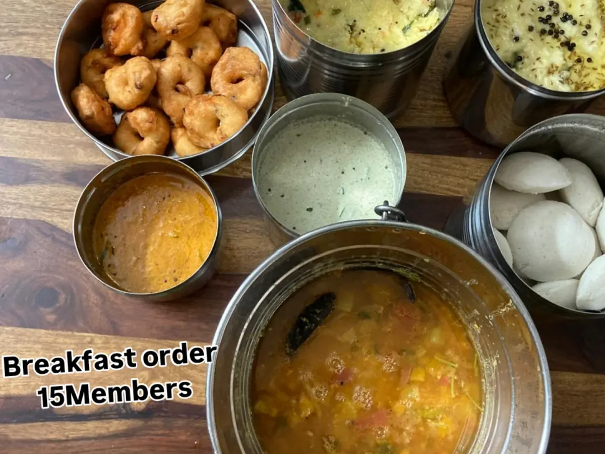 Idli, ghee pongal and medu vadai are ready with sambar and chutney in our customised housewarming breakfast for 15 members.
