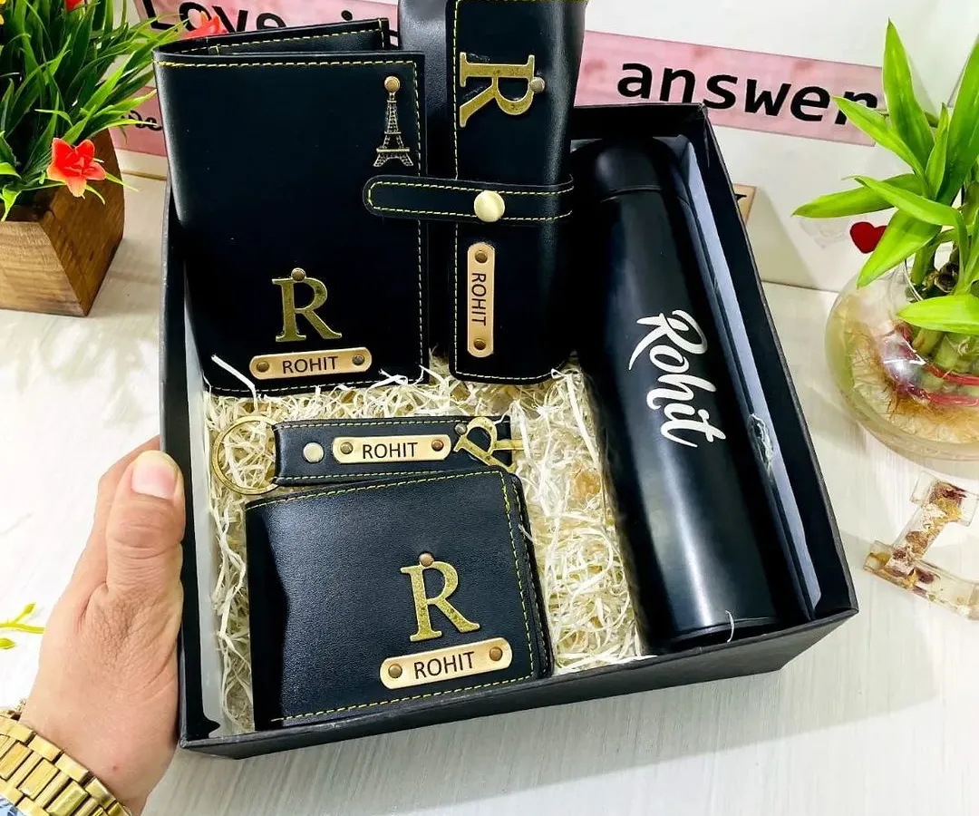 This is my premium, all-in-one men's gift hamper, perfect for birthdays or anniversaries. It includes a personalized temperature bottle, a vegan leather wallet, a matching passport cover, a sunglass holder, and a keychain, all customized with a name and initial.