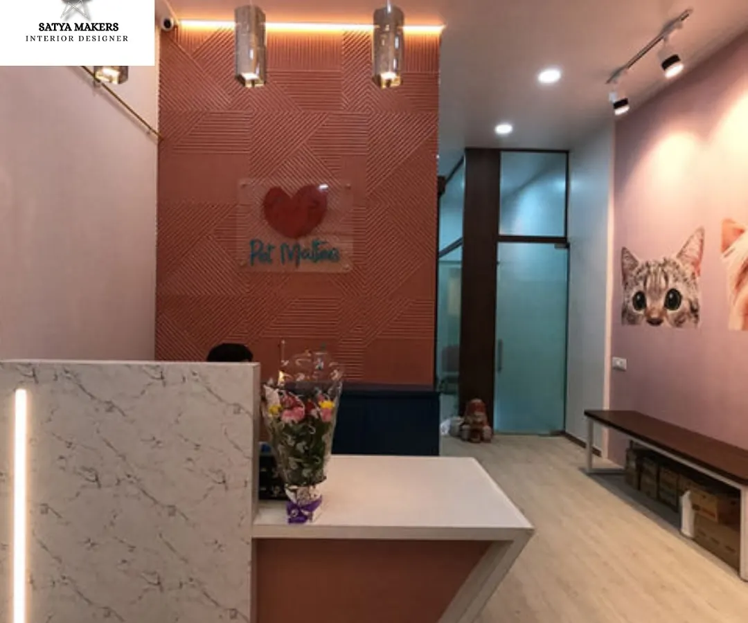 For this pet boutique, the goal was to create a warm and welcoming reception that felt both modern and playful. The design combines a textured feature wall, sleek lighting, and a marble-finish counter to establish a professional yet friendly brand identity.