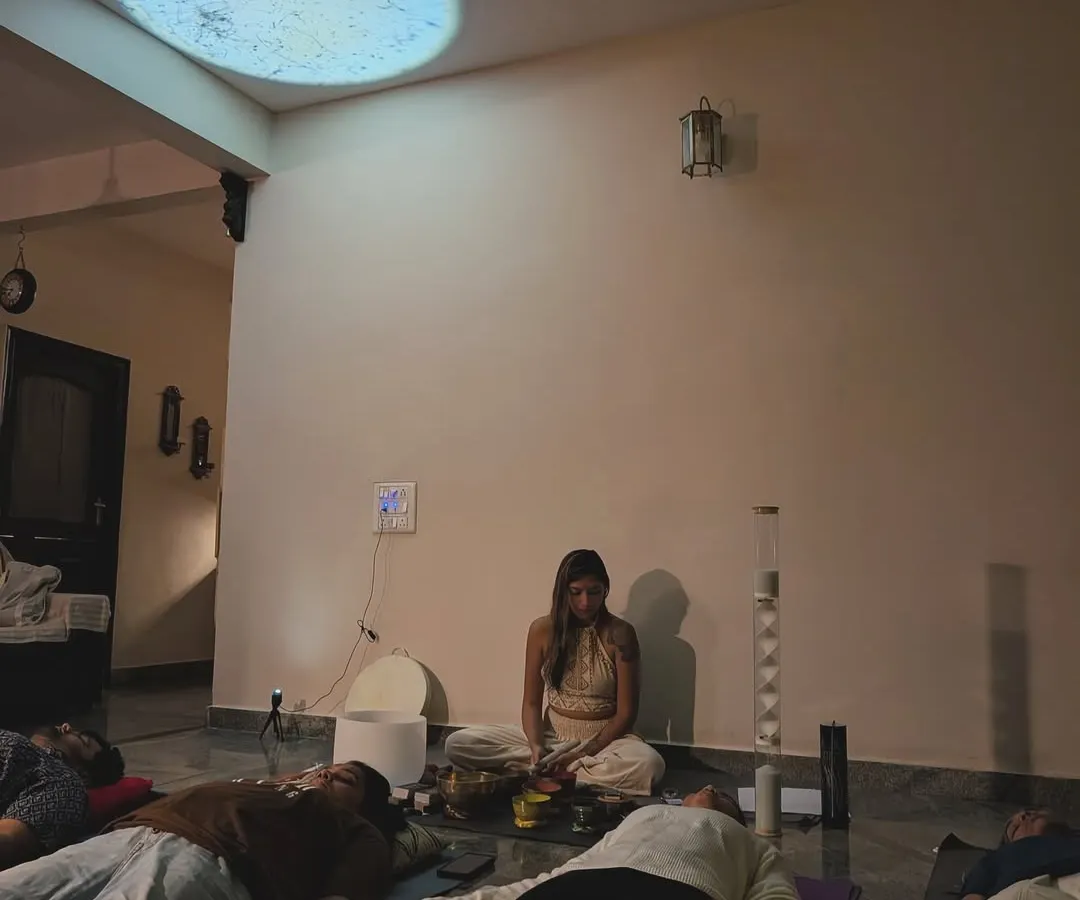 Here is a glimpse into one of my group sound bath meditations. Participants rest comfortably on their mats as I guide them into a state of stillness, surrounded by the gentle resonance of singing bowls and the soft glow of ambient light.
