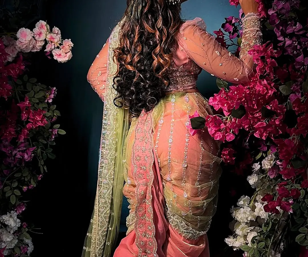 A glimpse of the artistry in my 'Menka' style Nauvari drape. The focus here is on the intricate pleating from the back, creating a dramatic and elegant silhouette that flows beautifully.