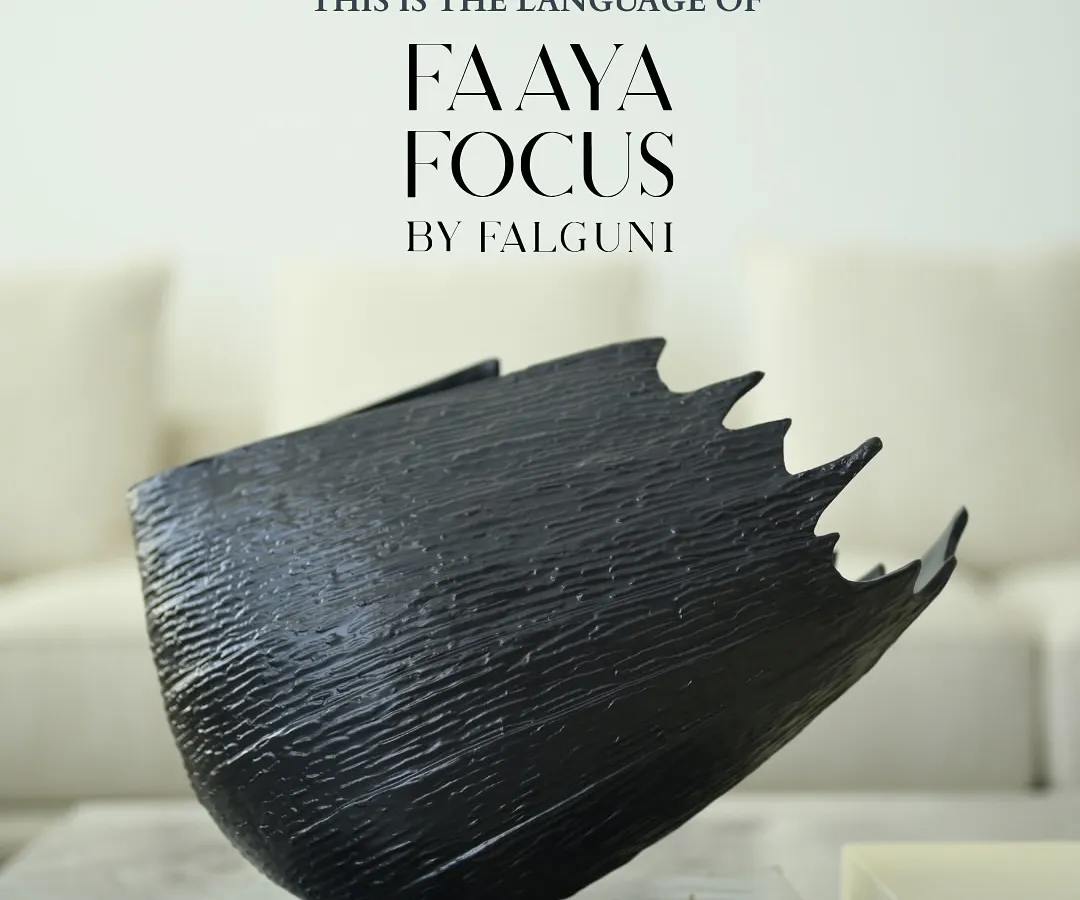 This is the language of Faaya Focus. Each piece is a statement, a sculpture designed to command attention and start conversations. This textured black vessel embodies our belief that home decor should be art.