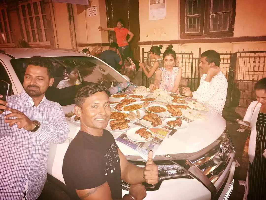 This is our kind of five-star dining. No reservations needed, just pull up, and your car bonnet becomes the best table in Mumbai. It's the real, chaotic, and beautiful street dining experience.