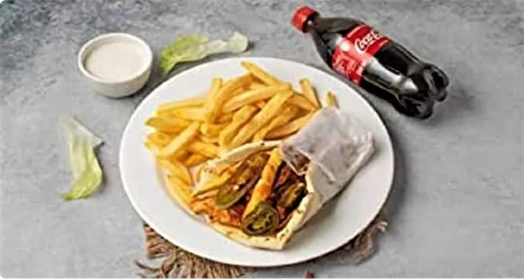 For a complete meal, you can't go wrong with my shawarma combo. It includes a juicy roll packed with chicken and jalapeños, a side of crispy fries, and a cold drink.