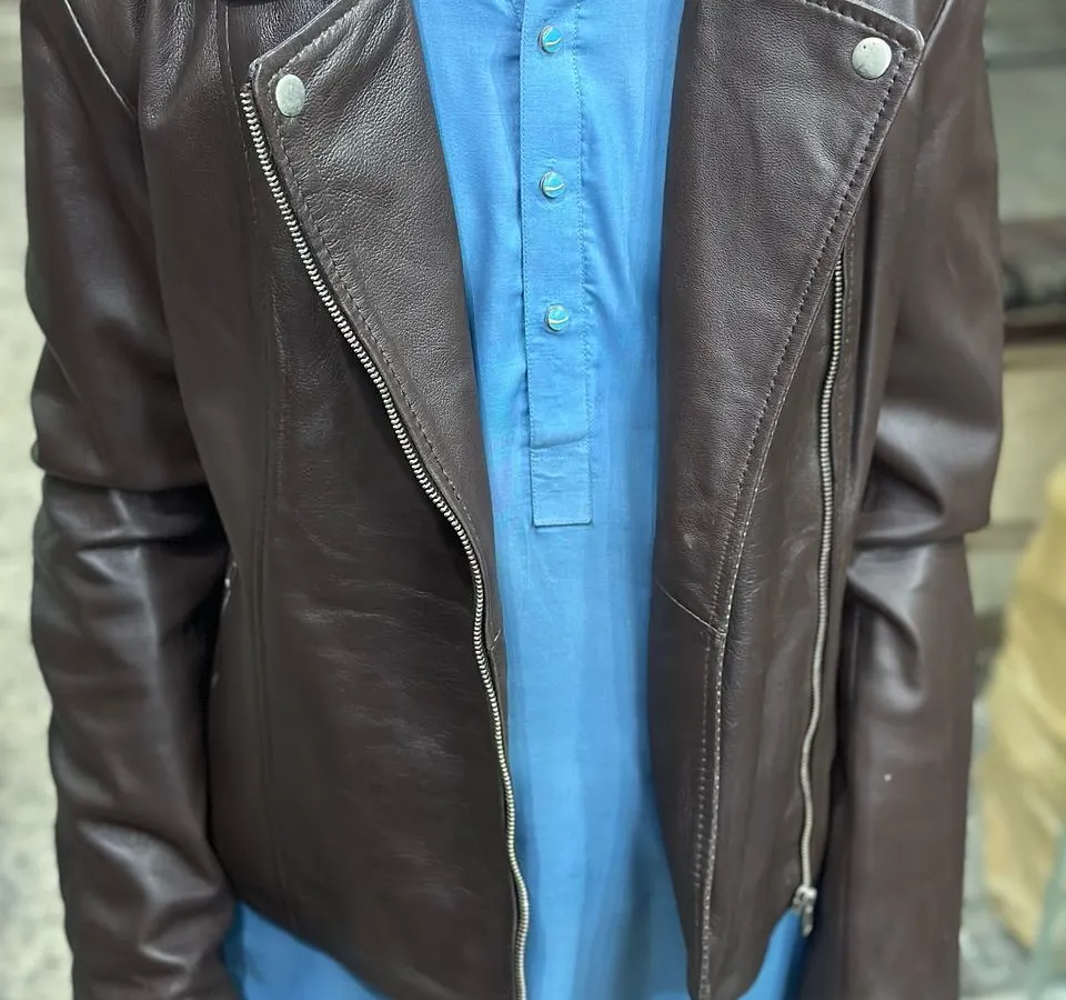 This is a genuine leather biker jacket from my Karachi shopping trip. I check the quality myself to make sure the fit and feel are just right, offering timeless styles for both men and women.