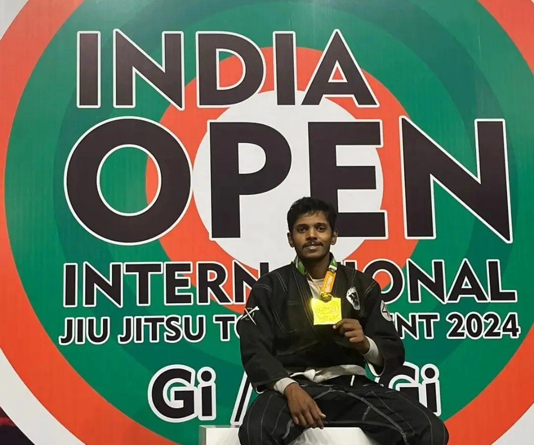 I am proud of this moment, winning a gold medal at the India Open International Jiu-Jitsu Tournament. I don't just teach; I actively compete to sharpen my own skills and bring that experience back to my students.