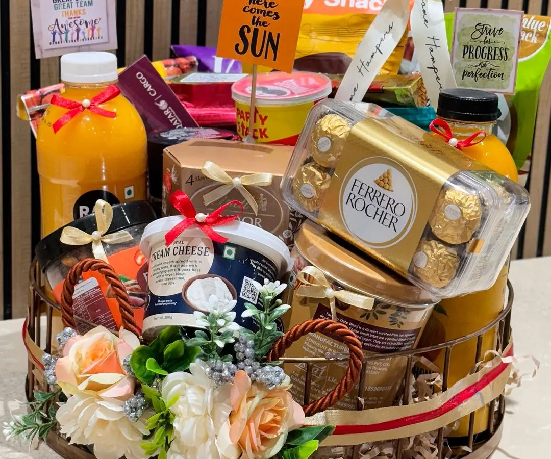 I was thrilled to design this gourmet hamper for a prestigious corporate client, Qatar Airways. It’s packed with premium international treats like Ferrero Rocher and Lindor chocolates, alongside healthy options like RAW Pressery juice, showing my ability to curate for a global palate.