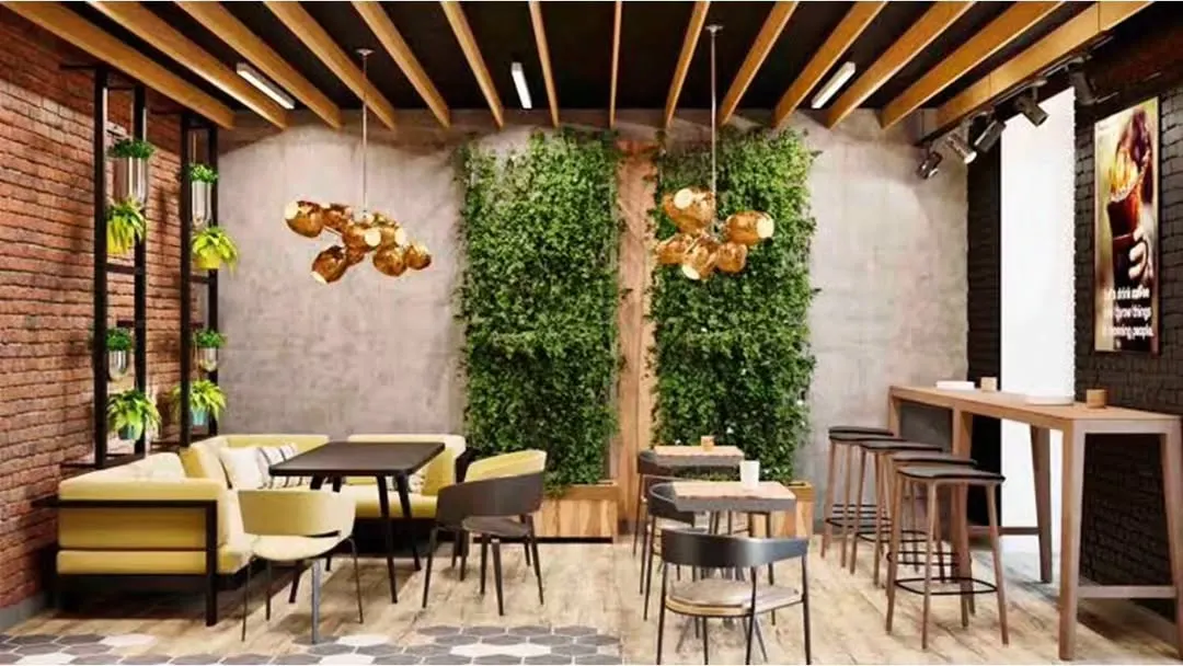 For this cafe, we created a warm and eclectic atmosphere using a mix of textures. The design combines exposed brick walls, statement green walls for a touch of nature, and varied seating arrangements including booth, bar, and table seating to cater to different customer groups.