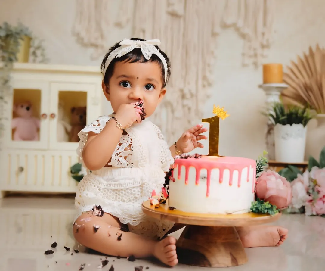 That first taste of birthday cake is a memory worth capturing in all its messy glory. I design beautiful, themed cake smash sessions like this boho-chic setup, complete with a custom cake, so you can just enjoy the moment.