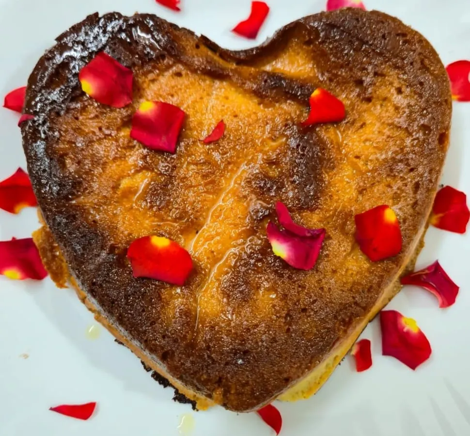 We pour our heart into our work, and this heart-shaped Chhenapoda is proof. Garnished with fresh rose petals, this baked cheese delicacy is a unique and thoughtful gift for anniversaries, birthdays, or simply to show someone you care.