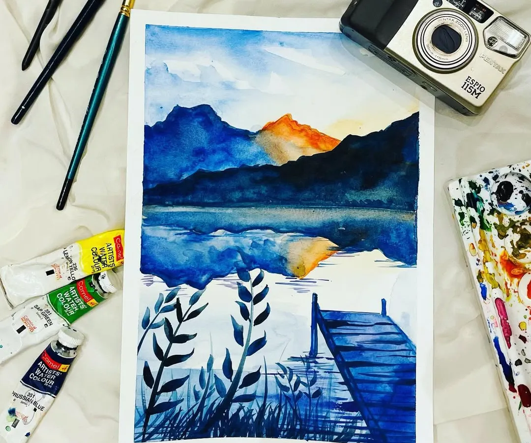 This serene landscape is one of the beautiful pieces we create in my online watercolor workshop. I'll guide you through every step to paint your own version, even if you are a beginner.