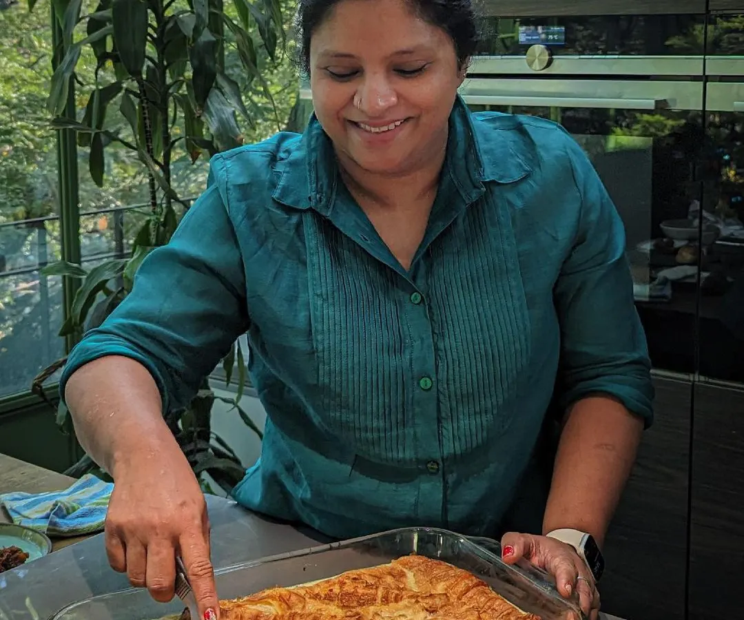 Food for me is tied to my happiest memories, and I started Travancore Tasties to share that feeling with you. Here I am, serving up a bread pudding, a dish that reminds me of my childhood and the big family feasts my Amma used to cook.