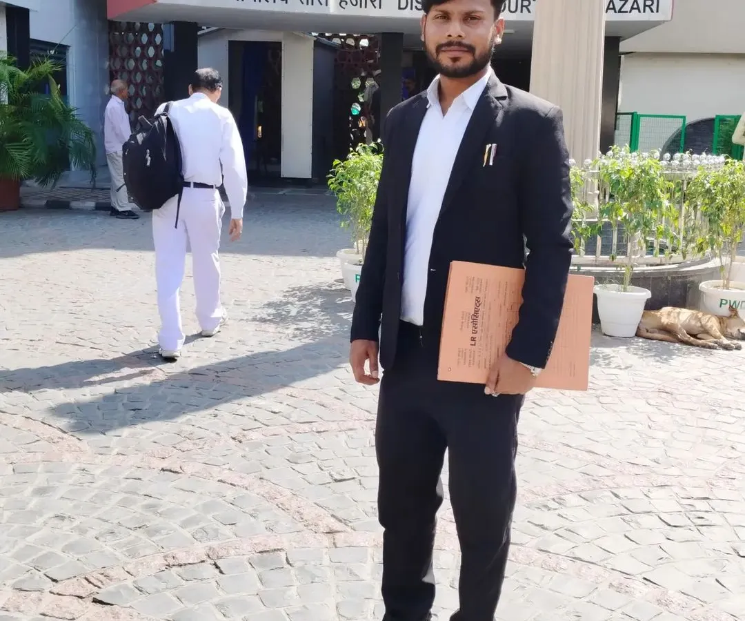 Here I am outside the Tis Hazari District Court, ready to represent my clients. My presence in these legal institutions is a daily part of my commitment to fighting for your rights.
