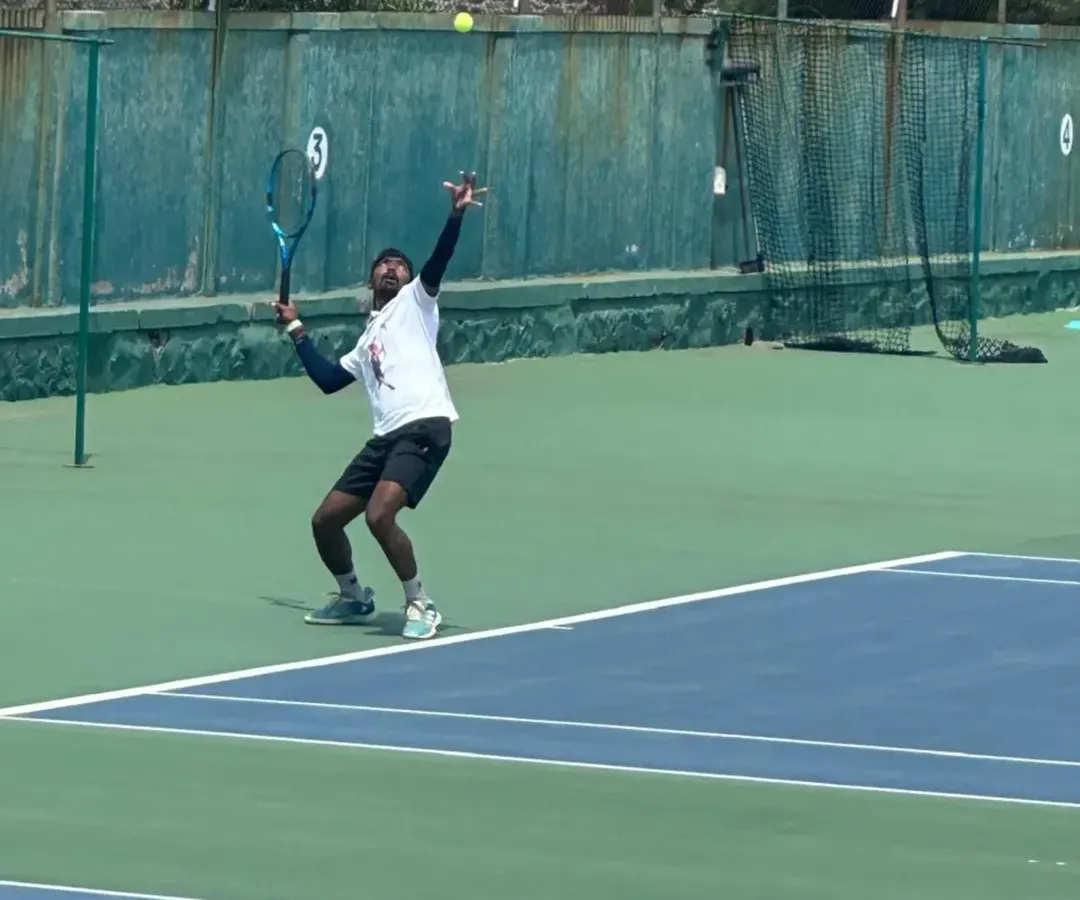 We lead by example. Here is our very own Coach Raju Muthukrishnan, an ITF World Masters Tour Champion, demonstrating the power and technique we instill in all our players. His success on the international stage is a testament to the high-performance coaching you'll find at our academy.