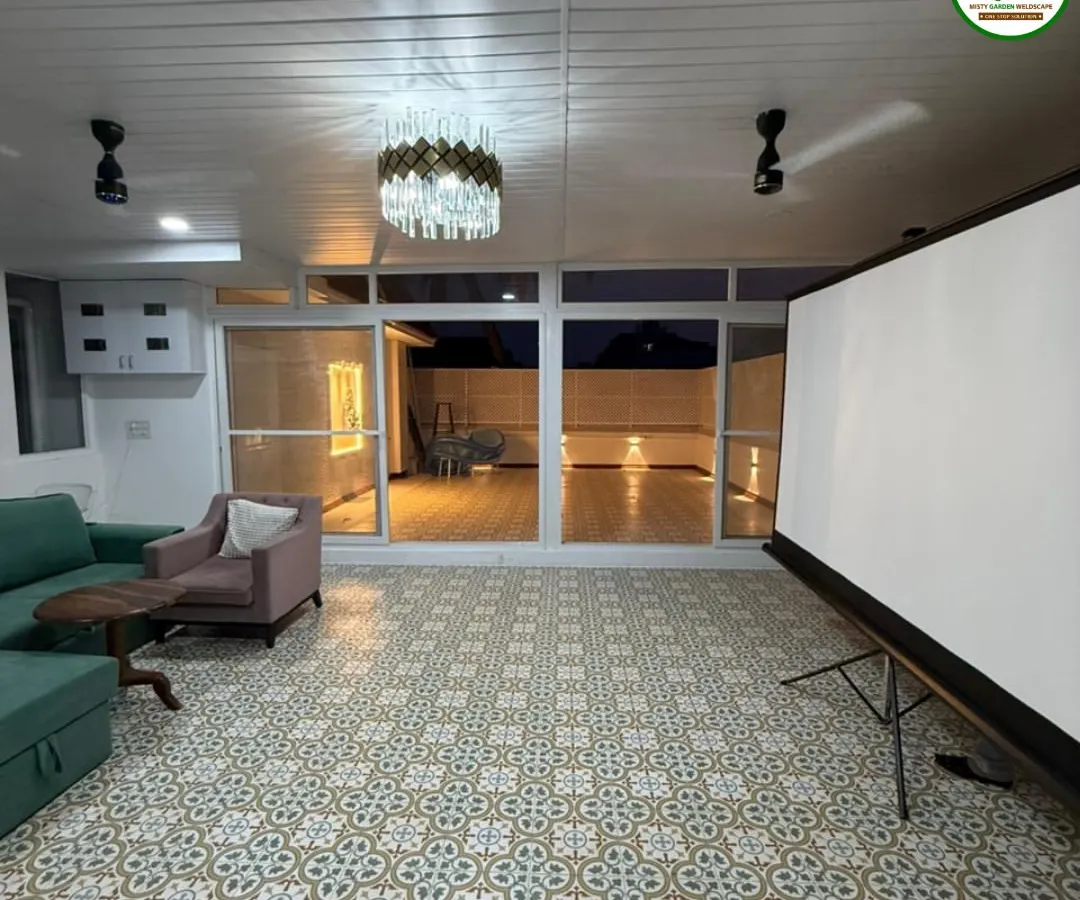 We converted this open terrace at Skylark Greens into a luxurious, fully enclosed room. Featuring a durable PUF sheet pergola, elegant PVC ceiling, and large UPVC sliding doors, this space is now a perfect, comfortable retreat for relaxation and entertainment, protected from the elements.