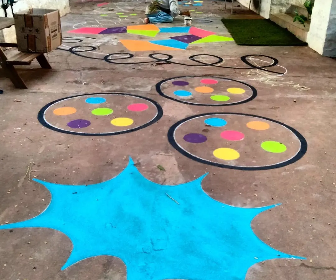 I turn plain floors into vibrant, 45-foot playgrounds. This interactive floor mural for Papagoya Micro School in Bangalore isn't just art; it's a stamina-building battle course designed to get kids moving, laughing, and learning through play.