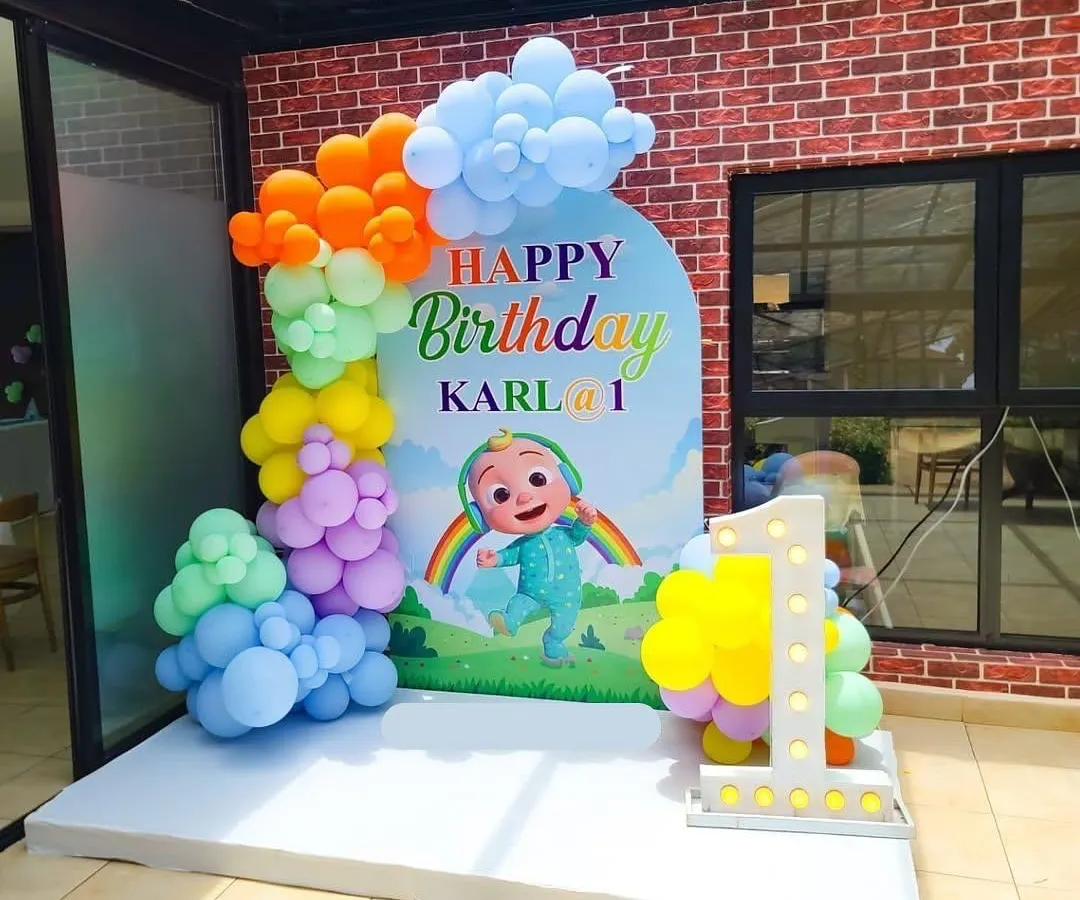 I love bringing popular themes to life, especially for a child's first birthday. This Cocomelon setup features a custom backdrop, a vibrant balloon garland, and a light-up marquee number to make the celebration extra special.