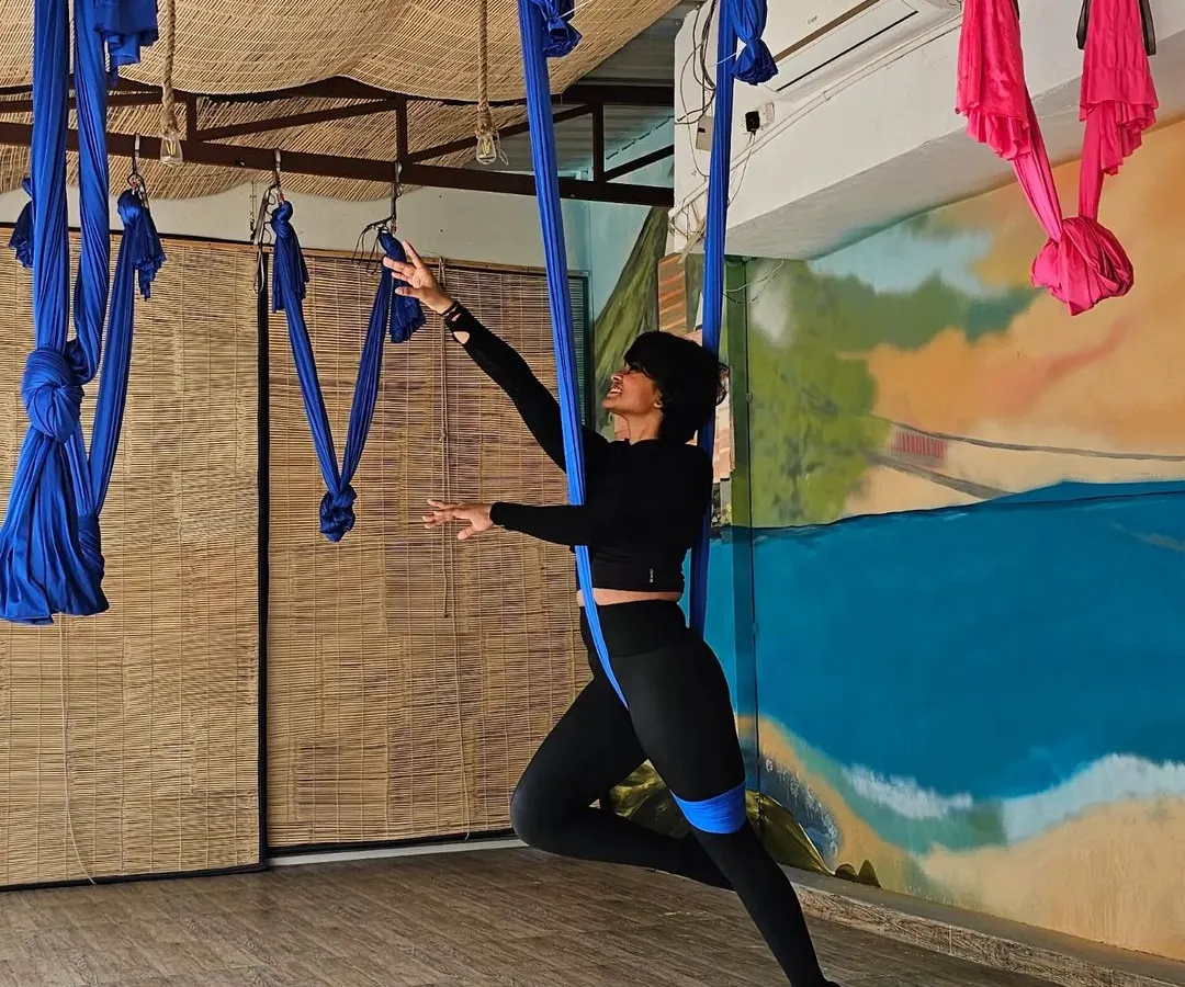 I truly believe that when walking becomes a struggle, you can learn to fly. Here I am in my element during my Aerial Yoga teacher training. This practice was my gateway to moving freely after my injuries, using the silk to support my body and build strength without impact.