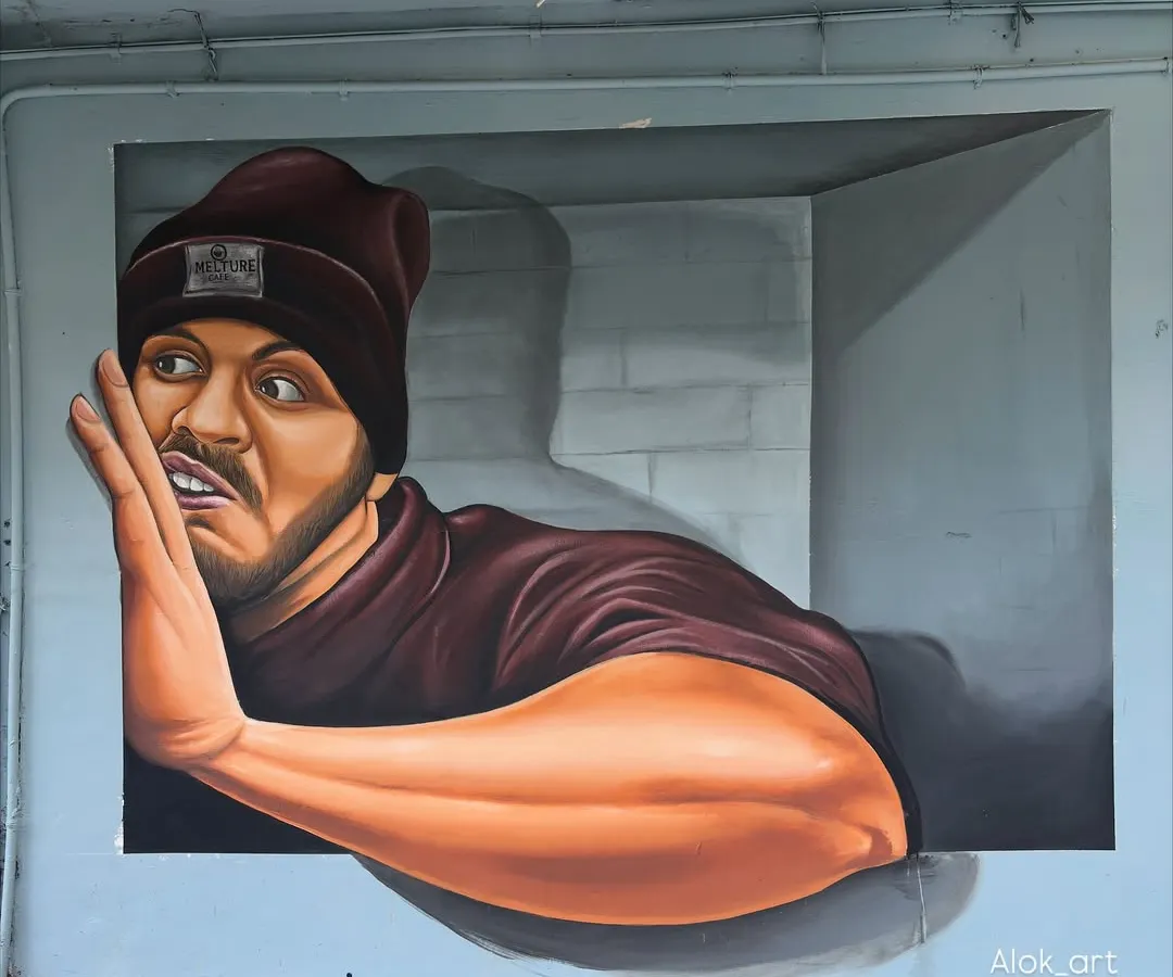 For commercial spaces like cafes, I create 3D illusion murals that are interactive and memorable. This piece shows a character breaking through the wall, creating a fun photo opportunity and adding a unique vibe to the environment.