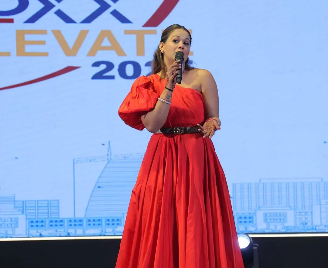Dressed in red for the ROXX ELEVATE 2025 gala. I believe in not just hosting an event, but becoming a part of its story and vision.