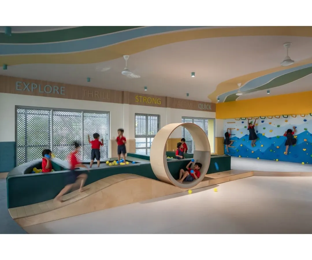 We believe play is serious learning. This soft-gym is designed for exploration and energy, with custom-built structures like a rolling wheel and climbing wall that encourage kids to be strong, quick, and adventurous. The dynamic design and vibrant colors create a space where children can truly thrive.