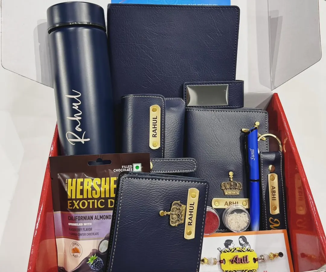 This Rakhi hamper is a perfect example of a complete gift solution. It includes a personalized flask, wallet, keychain, and other accessories, all coordinated in a stylish navy blue theme for a thoughtful and impressive present.