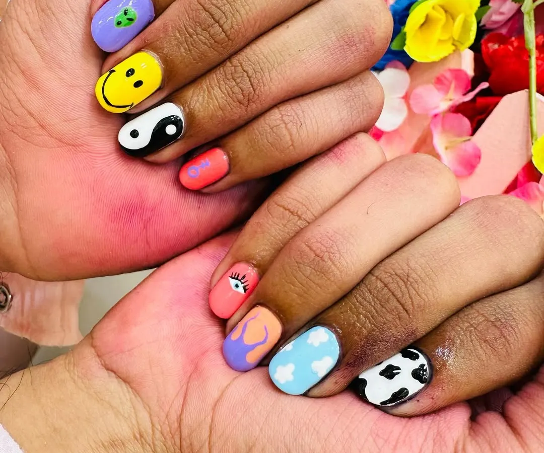 This is the kind of creative, hand-painted nail art you can learn to create. My course covers a wide range of fun and trendy designs, from characters and symbols to abstract patterns.
