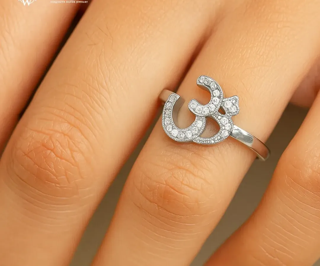 Wear your peace with our handcrafted 925 sterling silver Om ring. The sacred symbol is delicately studded with high-grade Zirconia, making it a sparkling daily reminder of balance and inner strength.