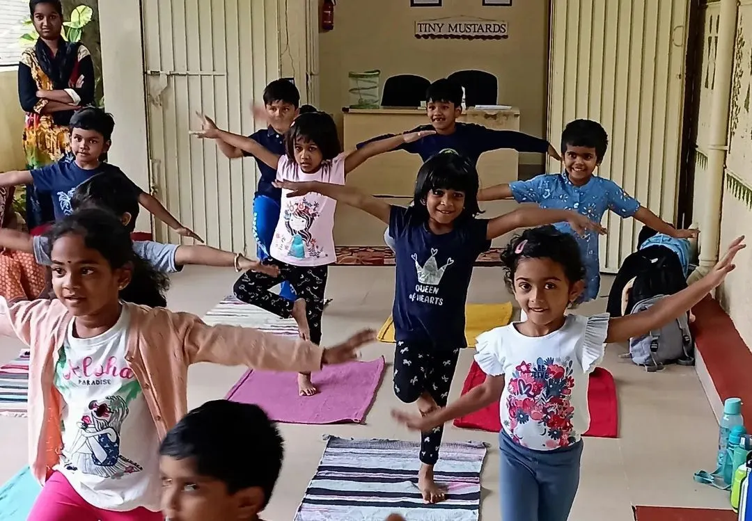 Our little yogis finding their balance during a kids' yoga session. I incorporate mindful movement to help children develop focus, coordination, and a positive connection with their bodies in a playful group setting.