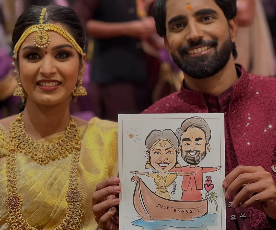 A beautiful moment from a South Indian engagement. I created this special caricature for the couple, showing them in a boat to celebrate their journey together. It's an honor to add a personal, artistic touch to such an important day.