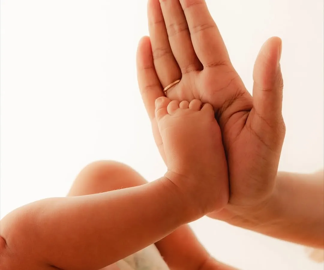 See how perfectly a tiny foot fits in the palm of your hand. My goal is to capture this exact scale and detail in a beautiful 3D foot sculpture you can hold onto long after they have outgrown your lap.