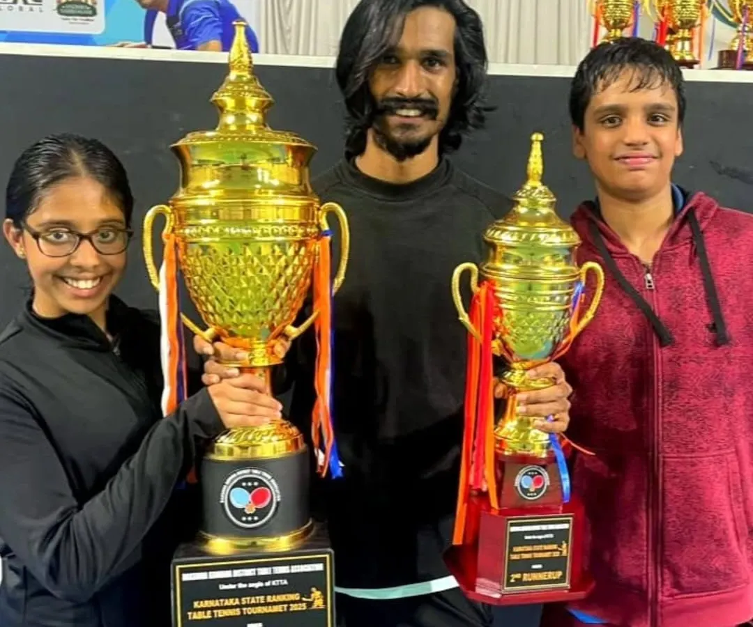 The results of dedication. I am proud to stand with my students Kaira and Pratham after their major wins at the 3rd State Ranking Table Tennis Tournament. We bring home trophies.