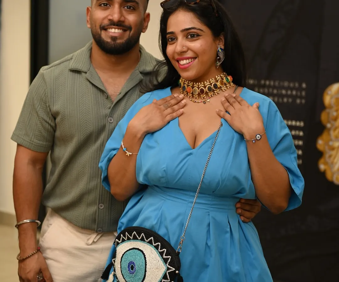 The perfect moment of discovery. A guest tries on a statement choker at a private jewelry salon in our Gurgaon studio, finding a piece that resonates with her personal style.
