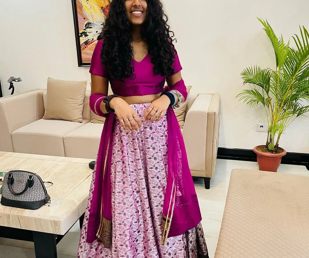 This project was so special to me. I had the honor of transforming a saree passed down through three generations into this adorable lehenga for a young girl. Preserving family memories in a wearable form is the most rewarding part of my work.