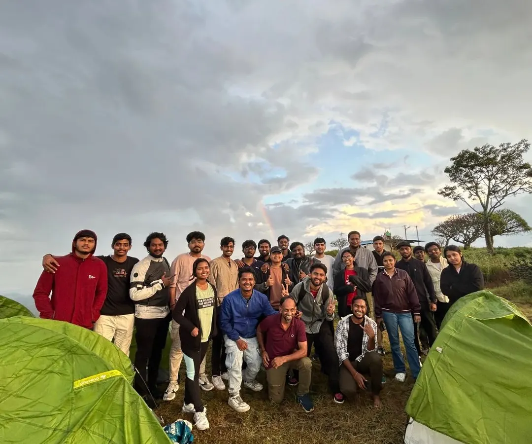 This picture says it all. A great group of people, tents pitched against a stunning sunset, and even a rainbow to top it off. This was a perfect moment from our camping trip at Narayana Giri.