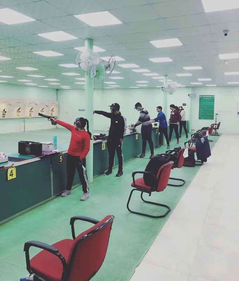 A typical day of practice at the Siri Fort Shooting Range. You can see a full line of my students, each focused on their target, building the discipline that marksmanship requires.