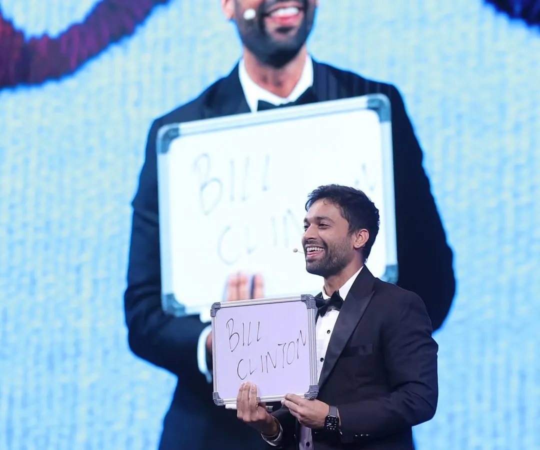 This is what my large-scale mentalism looks like. On stage at the IHCL Annual Business Conference, I correctly predicted a name someone was just thinking of. For big crowds, I use massive screens so everyone, even in the back, feels like they are part of the mind-reading experience.