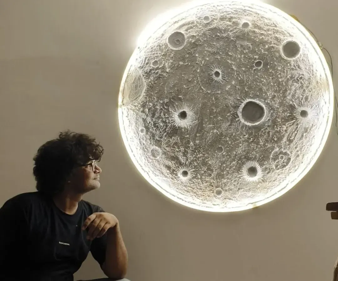 I love bringing big ideas to life, like this large, textured 3D moon wall art. It's crafted with multiple layers to create realistic craters and features a built-in backlight that gives it a magical glow. This piece transforms any room into a celestial escape.